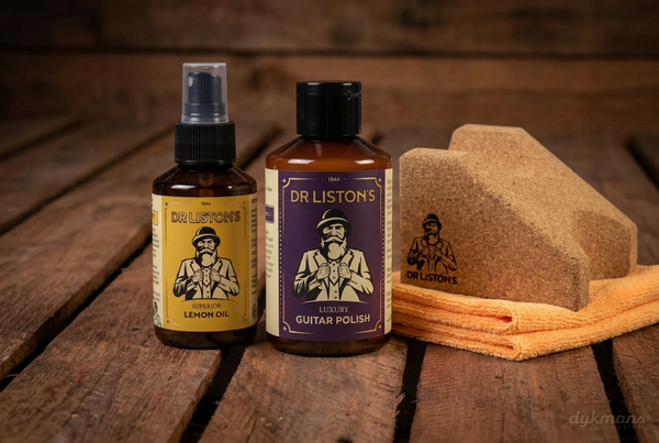 Dr. Liston's gitaaronderhoud en accessoires op een warme houten achtergrond